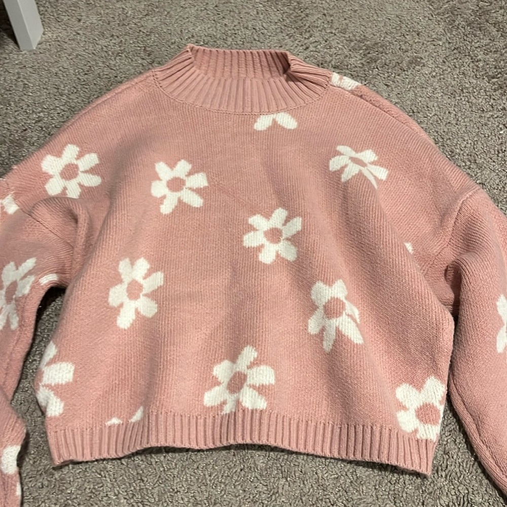 Light pink sweater with cream colored flowers